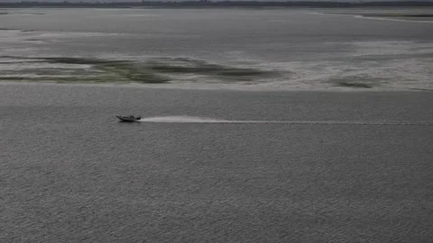 Evening cloudy gray view to motorboat at Dnieper river near Cherkasy, Ukraine Stock Footage 241021209