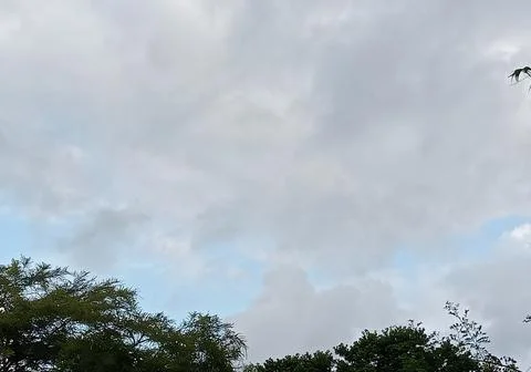 Evening cloudy sky Stock Photos