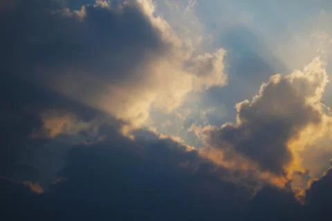 Evening cloudy sky at sunset Stock Photos