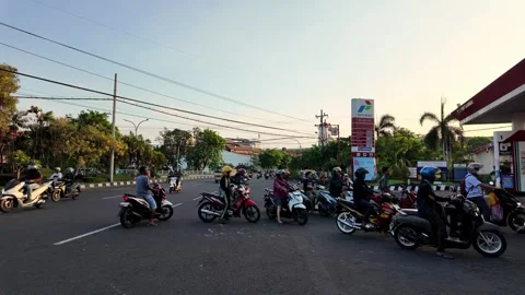 Evening Commuters Lined Up at Pertamina Station Stock Footage 345199383