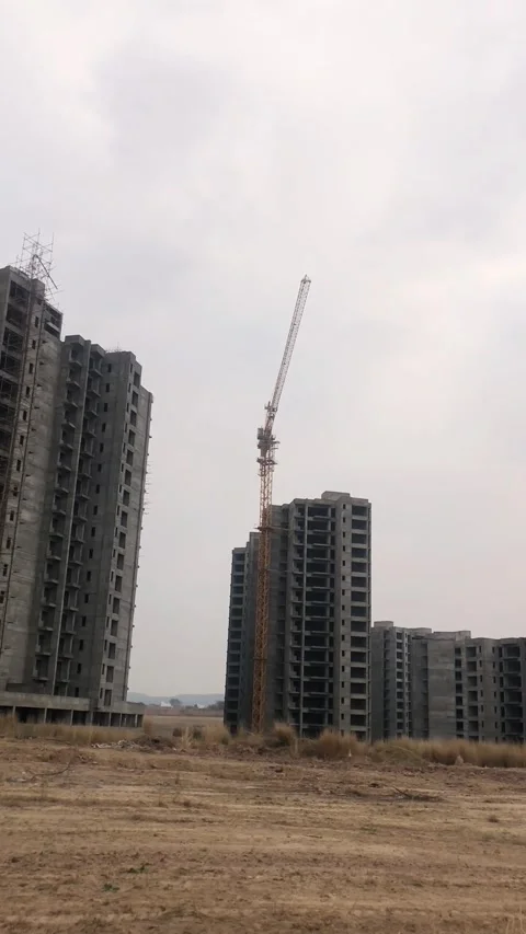 Evening Construction Site with Cranes at Apartment Building Project 스톡 동영상 345036834