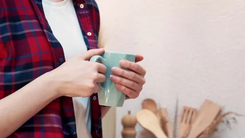 Evening conversation between two friends tea cup closeup Stock Footage 176338954