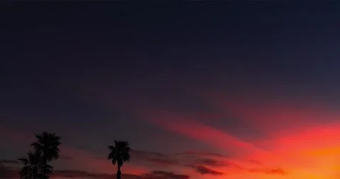Evening creates a breathtaking bridge between waking paradise and dreamy night. Vídeo Stock 334103445