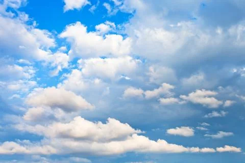 Evening cumulus clouds Stock Photos