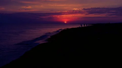 Evening dawn, the sun is sinking into the sea Stock Footage 165116207