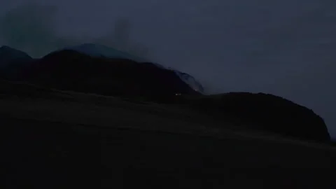 Evening disastrous fire and smoke on Arthurs Seat in Edinburgh, Scotland Stock Footage 325849029