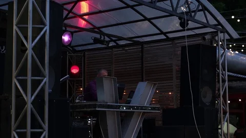 Evening DJs play music at an open-air party Stock Footage 111046911