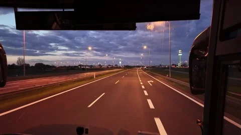 Evening drive along a modern highway viewed Stock Footage 342318987