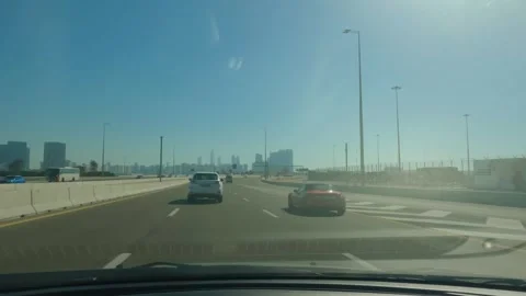 Evening Drive Through Abu Dhabi: A Spectacular View from the Car Window Stock Footage 241142826