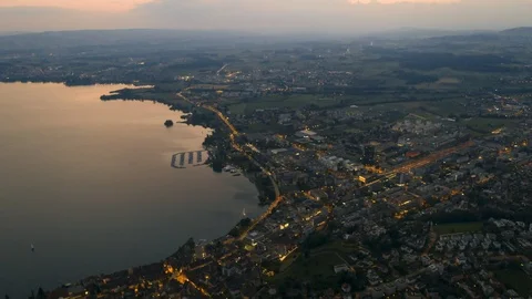 Evening drone flight over Swiss crypto city Zug (Stadt Zug) and lake Zug Stock-Footage 112868658