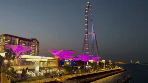 Evening Dubai, carousel and night city Stock Footage 228734150