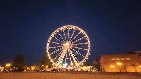Evening, Ferris wheel in timelapse mode Stock Footage 284379729