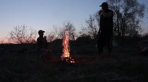 Evening, fire, father and son.mp4 Stock Footage 45410863