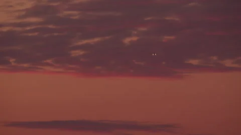 Evening flight amid crimson clouds Stock Footage 268245016