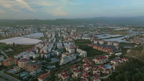 Evening flight over Avsallar at sunset Stock Footage 256926105
