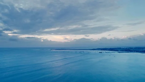 Evening flight over the calm ocean Stock Footage 121307801