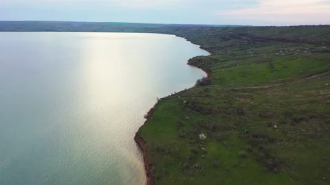Evening flight over a forest lake Video stock 153042686