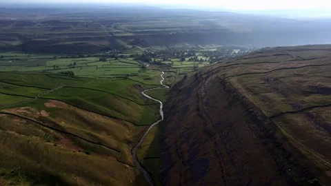 Evening flight over the green mountains Stock Footage 297843112