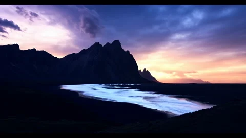 Evening flight over the mountains of a ocean in Island Stock Footage 297119147