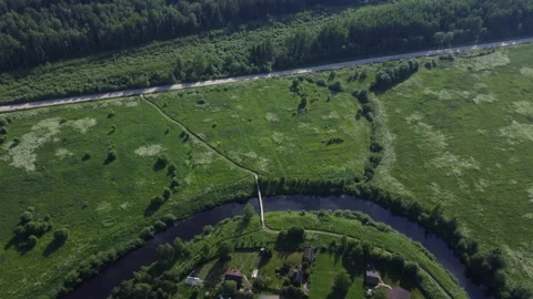 Evening flight over the river among the fields Stock Footage 157697142