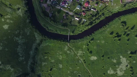 Evening flight over the river among the fields Stock Footage 157697208