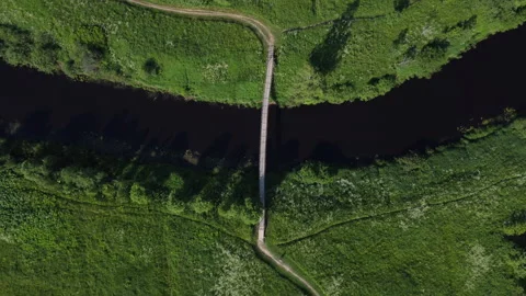 Evening flight over the river among the fields Stock Footage 157697433
