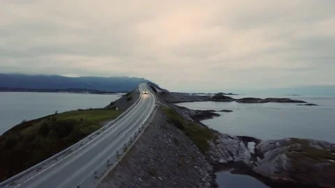 Evening flying over the bridge next to the cars, islands in Norway Stock Footage 224142487