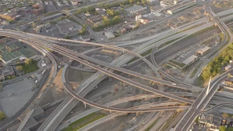 Evening Flyover of Turcot Interchange Highway Ramps and Rail Lines Stock Footage 345268950