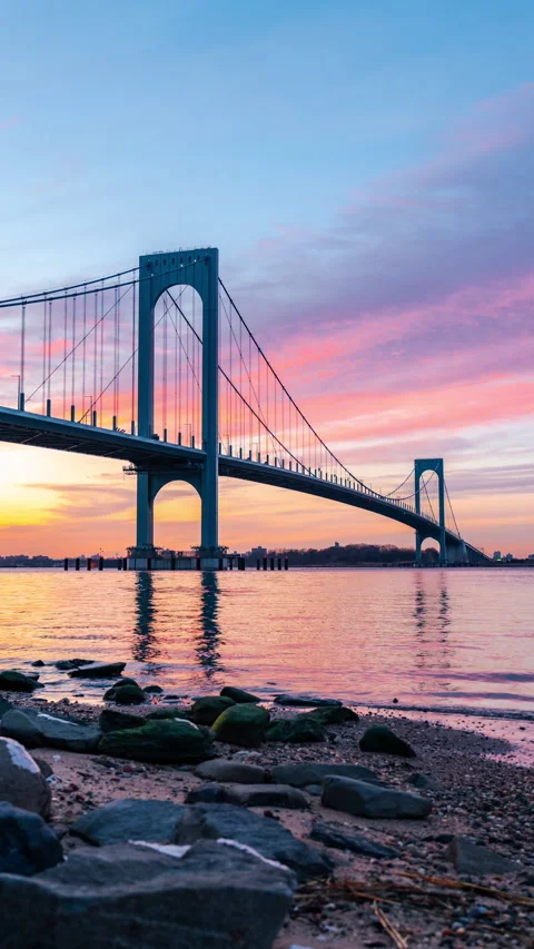 Evening glow timelapse next to the cross river bridge Stock Footage 302950945