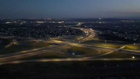 Evening highway crossing after sunset aerial zoom-in Stock Footage 219566333