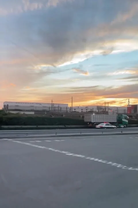 Evening Highway Glows Under Radiant Sunset Stock Footage 321181027