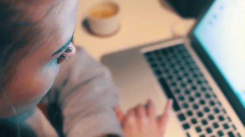 Evening at home, woman using laptop Stock Footage 72955152