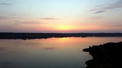 Evening huge calm lake Stock Footage 203788644