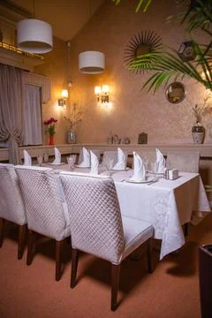 Evening interior of the restaurant with lighting Stock Photos