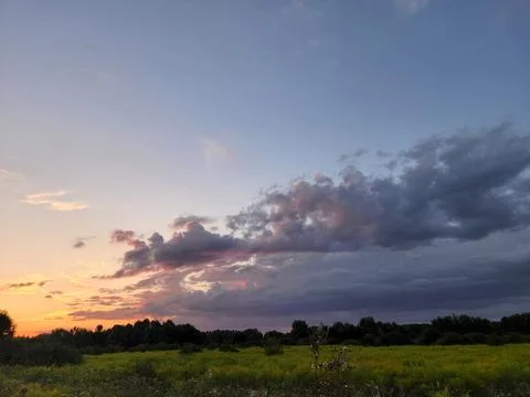 Evening landscape with clouds. Landscape in cloudy weather Stock Photos