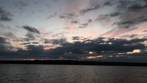 Evening landscape river and clouds dark and pink Stock Footage 159290176