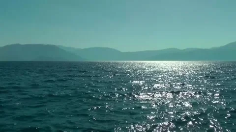 Evening landscape with a sparkling path on the sea surface Stock Footage 314662526