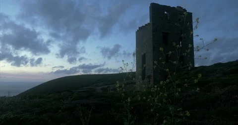 Evening landscape view looking up at Cornish mine engine house. Copy space. Stock Footage 115333383
