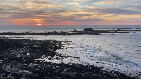 Evening light and sunset on the Oregon Coast looking out to seastacks Stock Footage 329449226