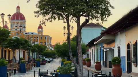 Evening Light Casts a Golden Glow Over Granadas Cathedral in Nicaragua Stock Footage 303825110
