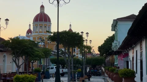Evening Light Casts a Warm Glow Over Granadas Historic Cathedral in Nicaragua Stock Footage 302741305