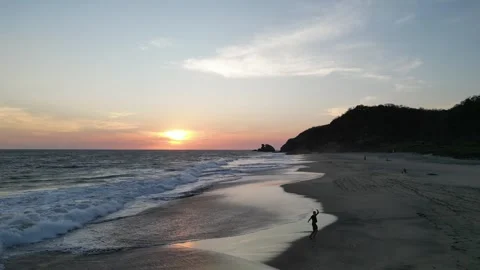 Evening Light Illuminating a Quiet Bay Mazunte Mexico Stock Footage 321489979