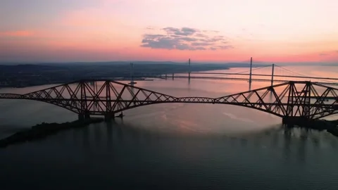 Evening Light Over Firth of Forth Three Bridges, Scotland 4k Stock Footage 172550221