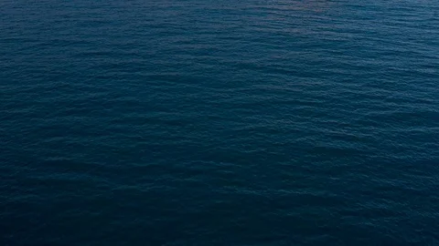 Evening light at the post of the sun with some small islands on the coast  Vídeos de archivo 110367000