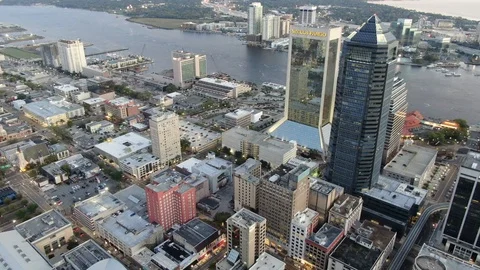 Evening lights across the office core in downtown Jacksonville Florida Stock-Footage 104735569