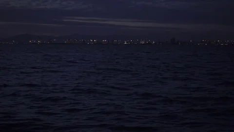 Evening lights of the seaport Stock Footage 84739394