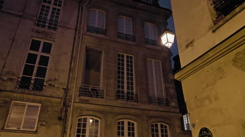 Evening lights shine on the romantic streets of Paris Stock Footage 314160381
