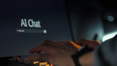 In the evening a mans hands rapidly type a query into the AI chat interface Stock Footage 331474109