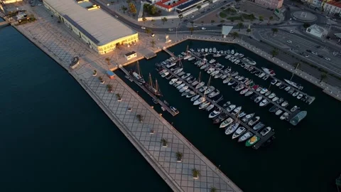 Evening marina with glowing lights and moored boats at Setubal Video stock 346060342