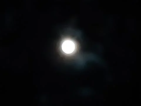 In the evening the moonlight shone in the eastern sky and the sky was clear. Stock Photos